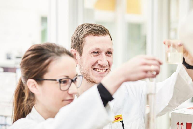 Woman and man in laboratory